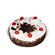 Biscuit cake with cherry. 5 red roses are delivered along with a cake.